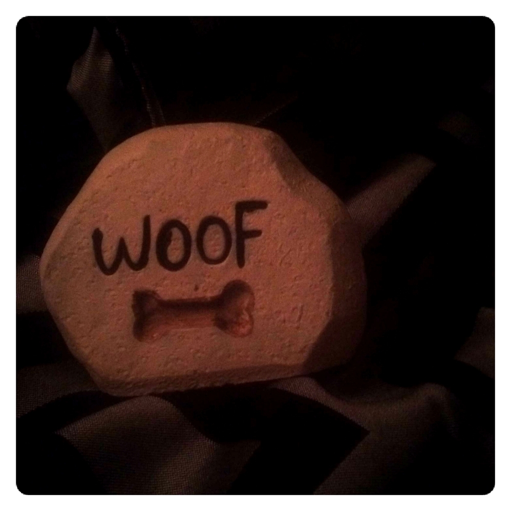 A statue that says woof